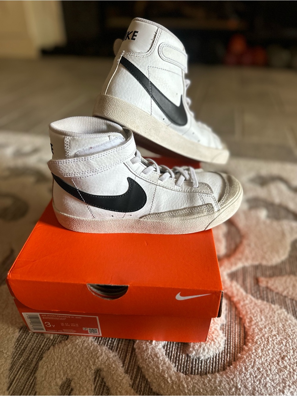 Nike Kids White High-Top Sneakers with Black Swoosh